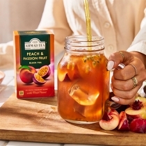 MELNĀ TĒJA AHMAD PEACH & PASSION FRUIT, MAISIŅOS FOLIJA APLOKSNĒS (006996) J